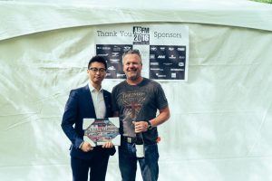 Paul Yang (left) of MCL Motor Cars presents Oliver Young with the Entrants Choice Overall Award for his 1935 Alvis Spped 25 Brooklands Custom.