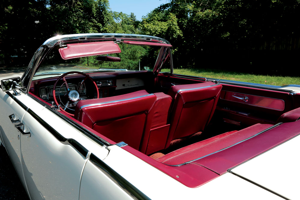 Most of the Lincoln's interior, including its red leather seats, is in its original condition.