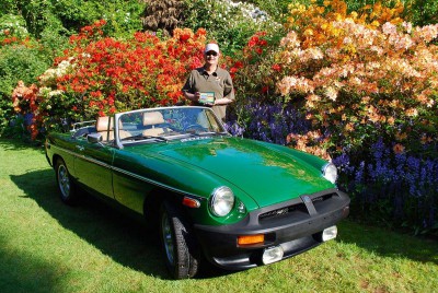 John Stanichak, a proud class winner for his later edition, fully restored MGB, at the 2012 Vancouver All British Field Meet at VanDusen Botanical Garden.