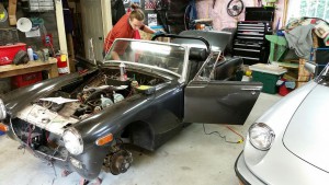 Ian Weverink work on his 1970 MG Midget in preparation for its debut at the 2015 Vancouver ABFM.