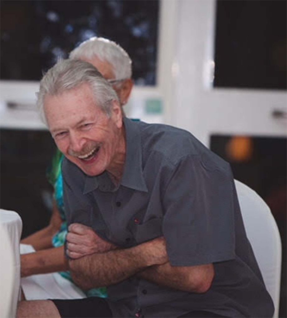 Paul Barlow shares a laugh with friends.