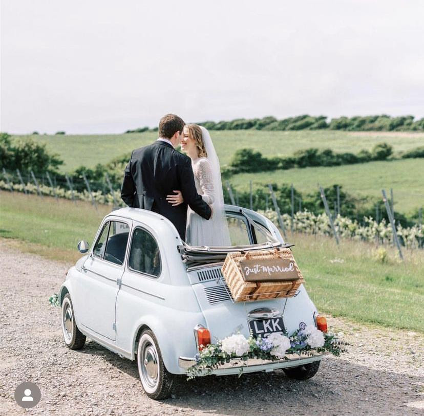 Tiny Fiat 500 is top wedding car on Instagram posts. Photo: courtesy StressfreeCarRental.com.